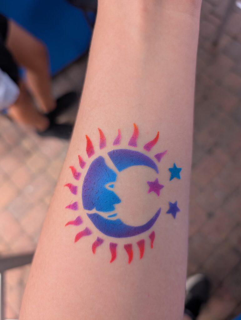 Sun and moon airbrush tattoo